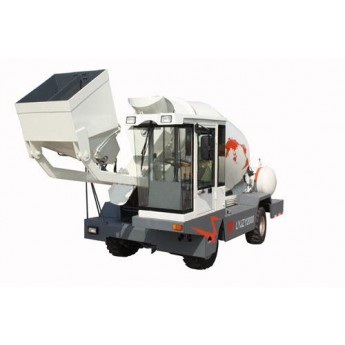 Self loading mobile concrete mixer
